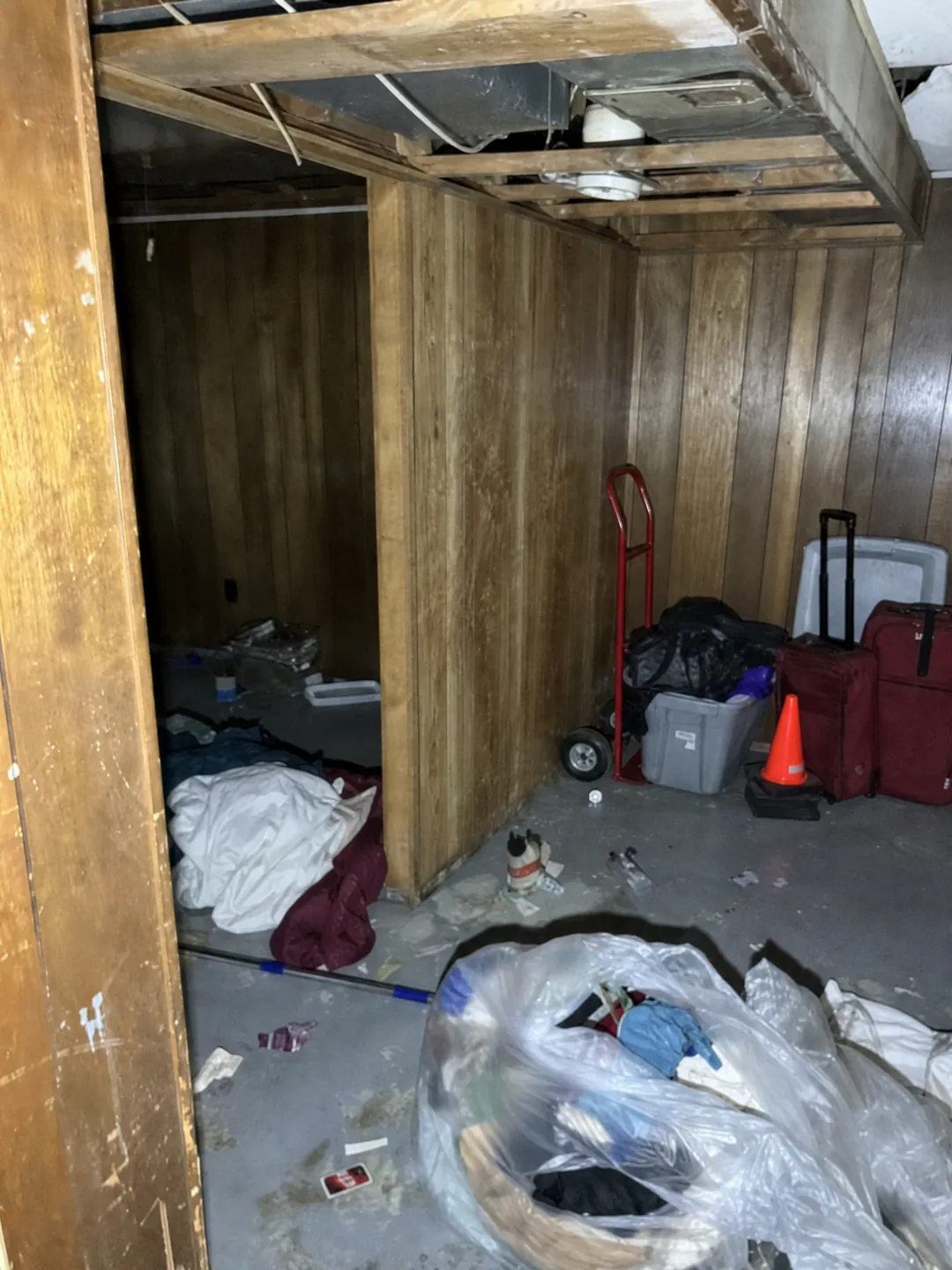 Basement storage area before a One Foot Forward property cleanout
