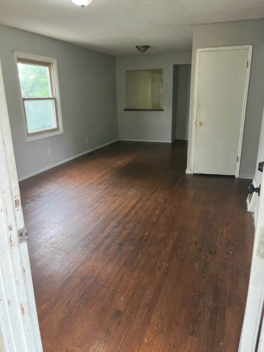 The same living area cleared after the property cleanout