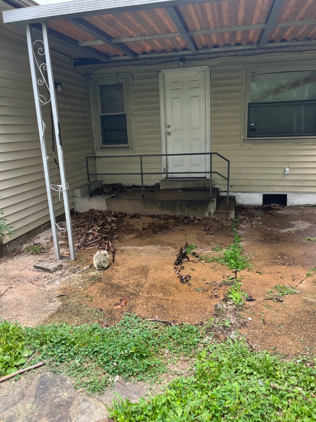 The same covered porch cleared after the cleanout