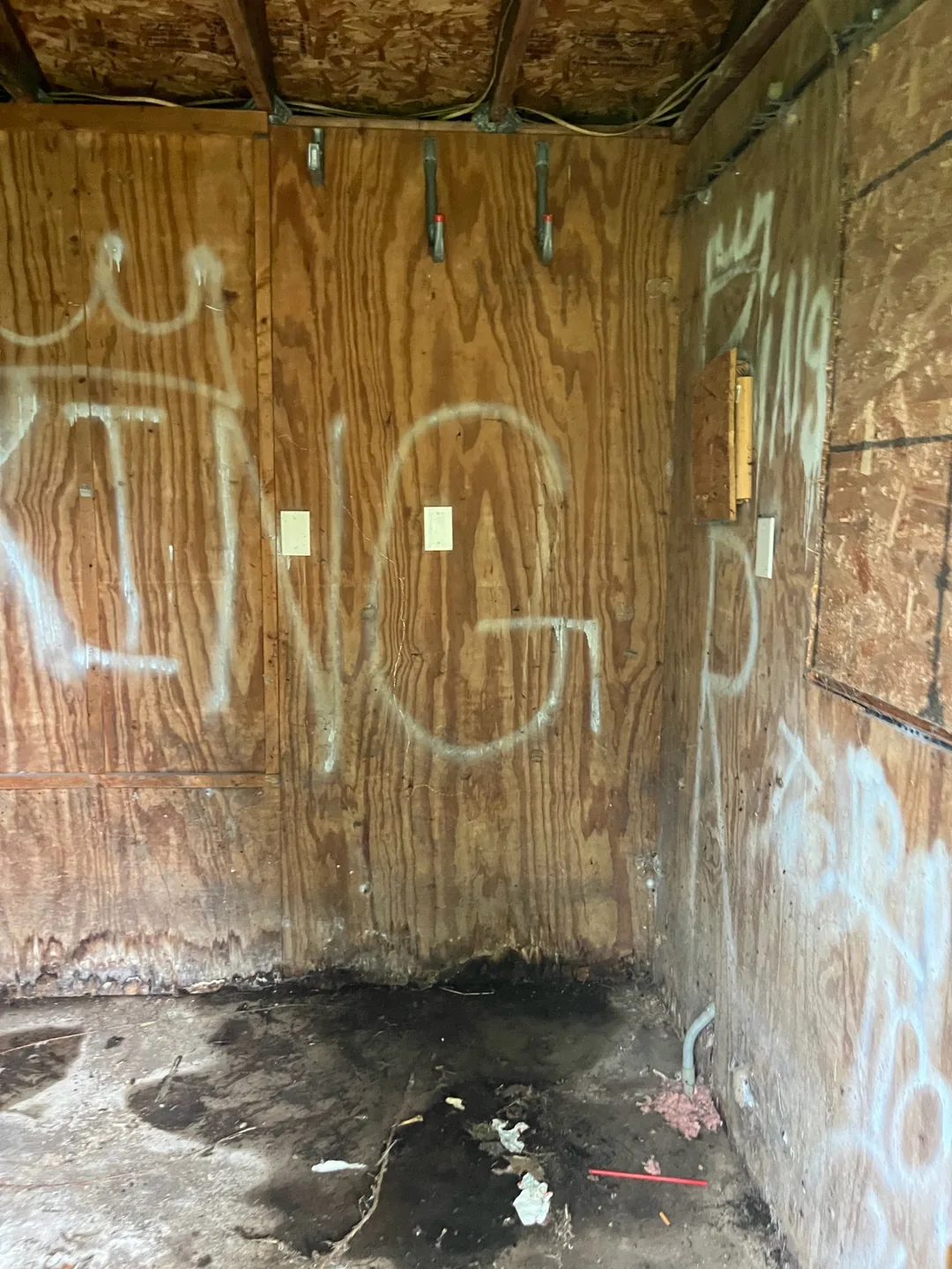 The same shed interior cleared after the cleanout