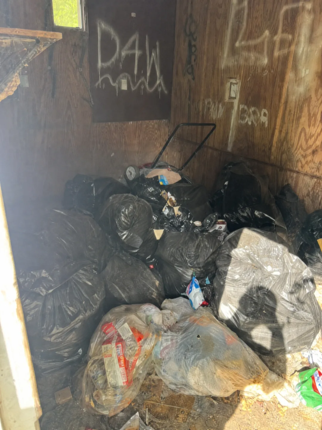 Shed interior before a One Foot Forward cleanout